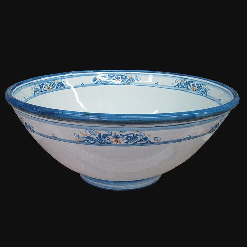 Ceramiche di Caltagirone fatti a mano, ciotola bianca con decori blu e arancio su sfondo nero