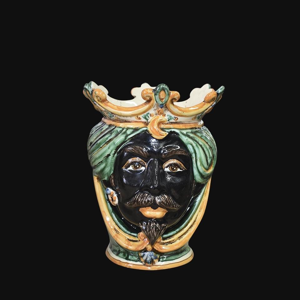 Ceramica di Caltagirone fatta a mano con volto barbuto e corona, arte tradizionale siciliana