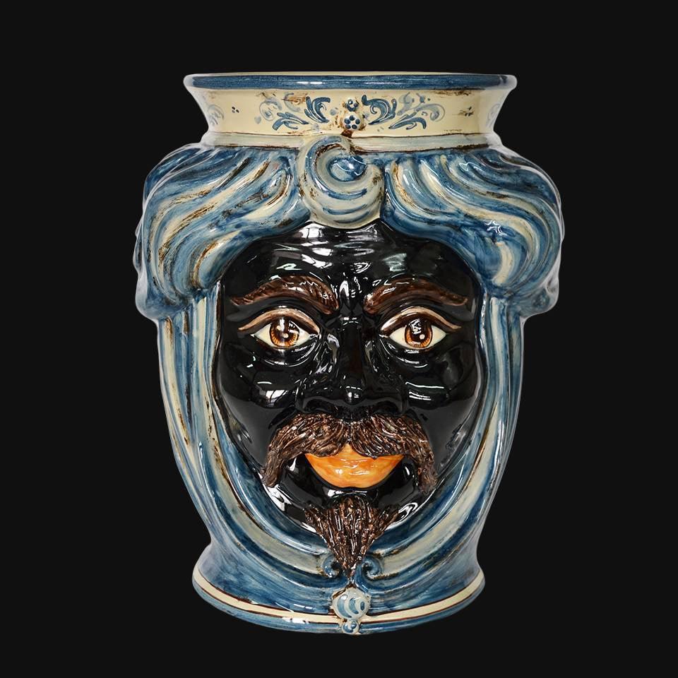 Ceramiche di Caltagirone fatti a mano con volto scolpito e decori blu